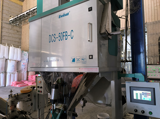 Machine à emballer manuelle automatique de riz d'Ewinall DCS-50FB-C 5kg 10kg 15kg 25kg